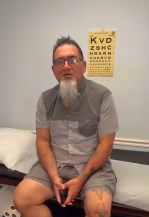 Patient in exam room at American WorkCare