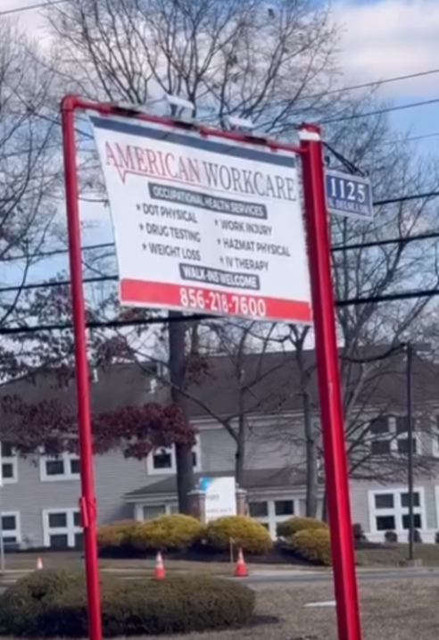 American WorkCare outdoor clinic signage at 1125 Delsea Dr